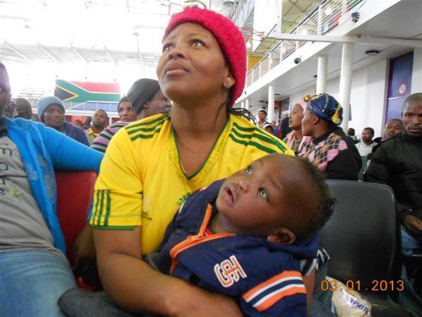 Mavis Mikani and her infant. Photo by Faizel Slamang.
