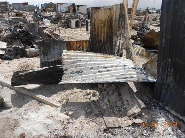 Ruins of Ntombi's kitchen. Photo by Faizel Slamang.