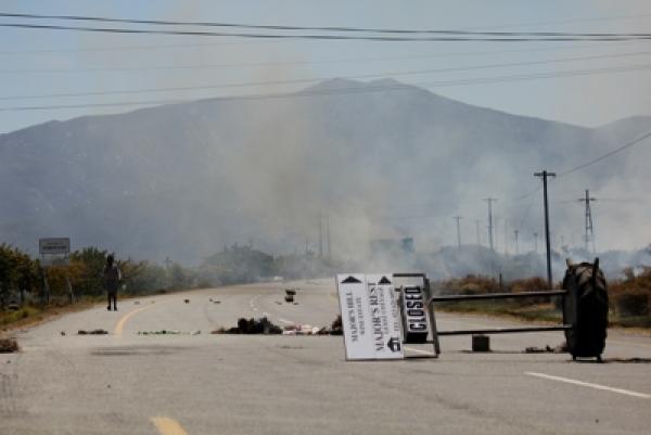 Rubble blocks the road to Robertson. Photo by Kate Stegeman.