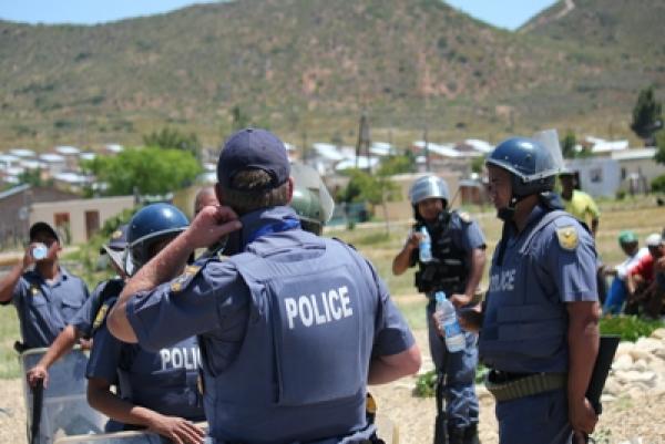 Police taking a water break. Photo by Kate Stegeman.