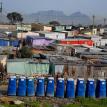 Row of portable toilets. Photo by Masixole Feni. Row of portable toilets. Photo by Masixole Feni.
