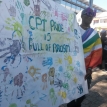 "Alternative Inclusive Pride" activists hold a banner accusing the mainstream gay pride march of being racist. Photo by Barbara Maregele. "Alternative Inclusive Pride" activists hold a banner accusing the mainstream gay pride march of being racist. Photo by Barbara Maregele.
