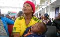 Mavis Mikani and her infant. Photo by Faizel Slamang.