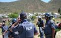 Police taking a water break. Photo by Kate Stegeman.