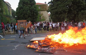 Photo of people burning art