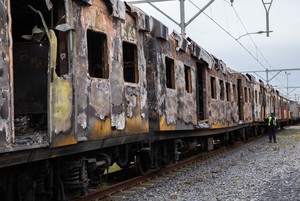 Photo of burnt out train coaches