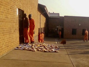 Photo of prisoners in a courtyard