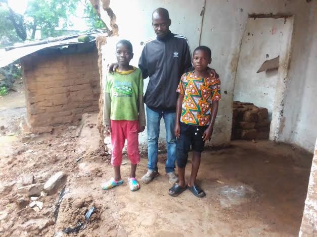 Watson Kapalamula and his children were swept away by flood waters and caught in a fig tree.