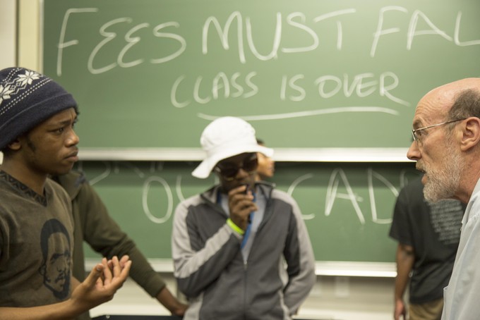 Photo of students and lecture debating