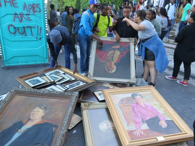 Photo of protesters and paintings on UCT