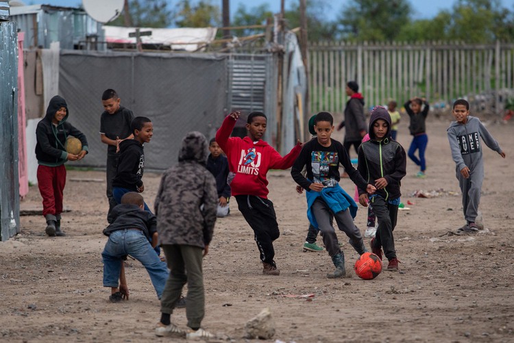 Photo of children playing soccer