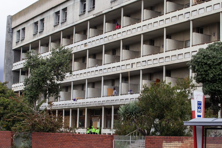Residents occupy the old Helen Bowden Nurses Home near the V&A Waterfront in Cape Town.