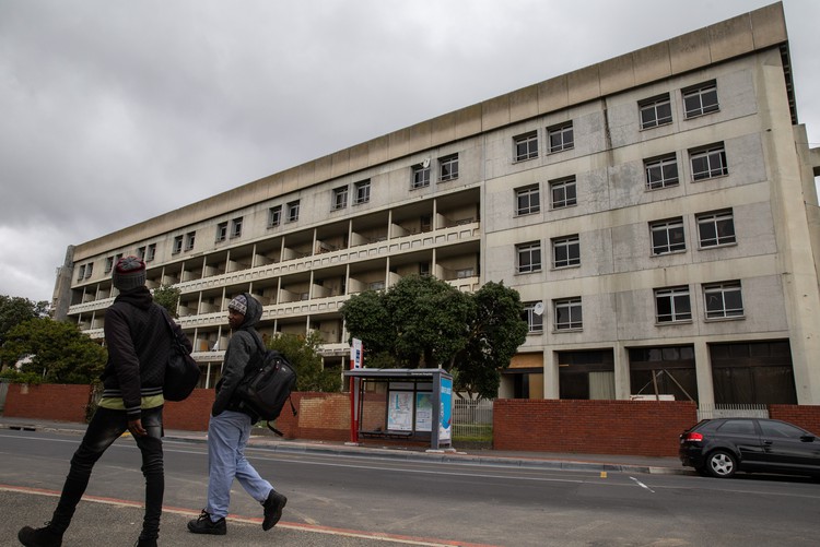 Residents occupy the old Helen Bowden Nurses Home near the V&A Waterfront in Cape Town.