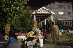 Residents spend the night outside Arcadia Place in Observatory after being evicted.