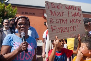 Photo of woman addressing protest