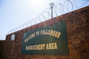 Photo of a sign outside a prison
