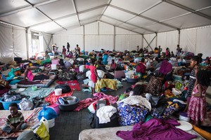 Photo of tent with refugees