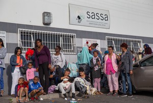 photo of people waiting in line at SASSA