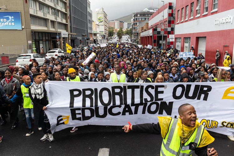 Photo of people protesting for better education