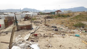 Photo of demolished shacks