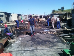 Photo of shacks after a fire