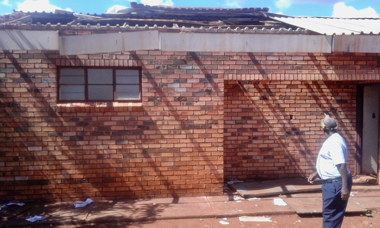 Photo of damaged school roof