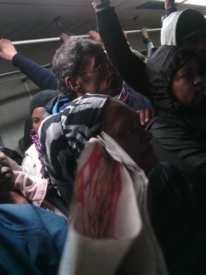 Photo of passengers in a crowded train