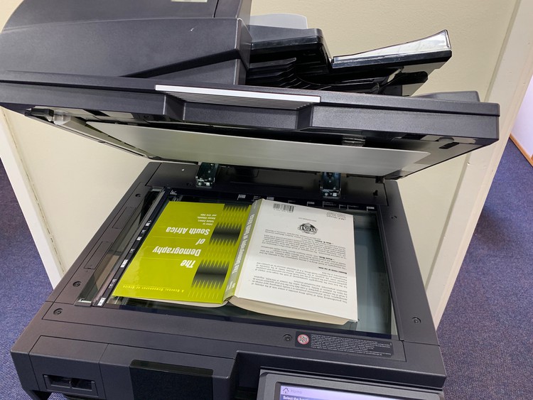 Photo of book in photocopier