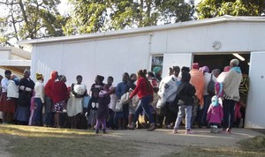 Photo of patients queuing outside Lusikisiki clinic