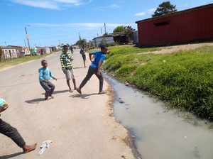 Photo of kids playing in a street