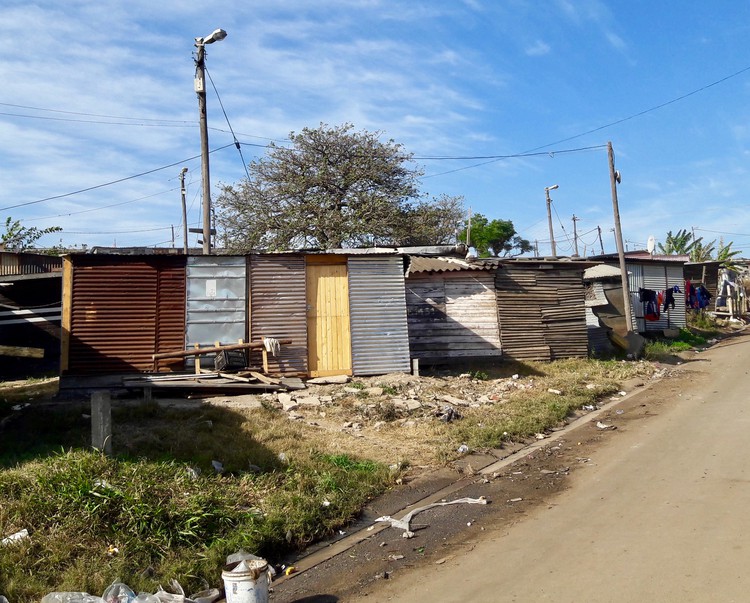 Photo of a street with shacks