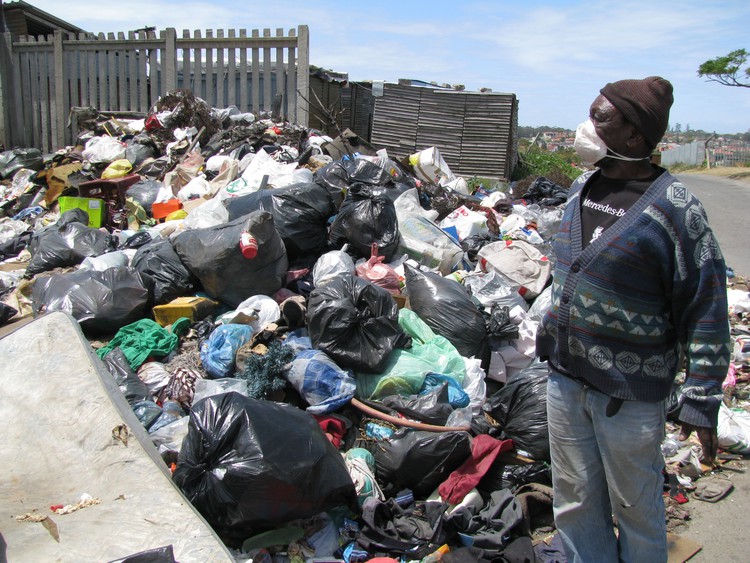 Photo of garbage near resident\'s shack