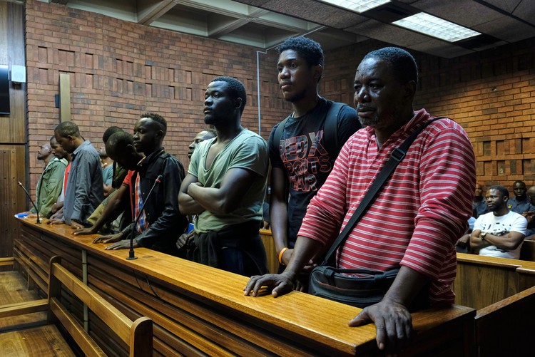 Photo of people in court