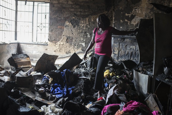 Photo of woman in burnt room