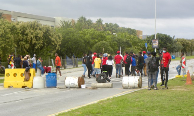 Students block a road on the South campus of Nelson Mandela University. Photo: Joseph Chirume.