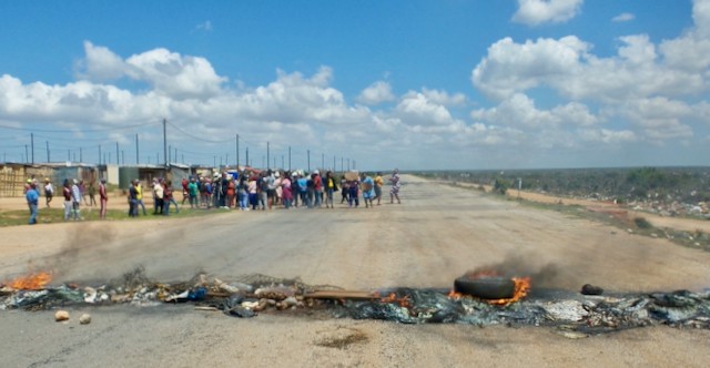 Photo of protesters blocking a road