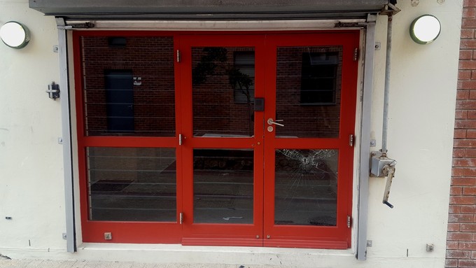 Photo of locked doors to an office