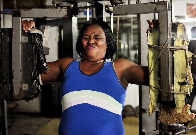 Photo of woman doing weights
