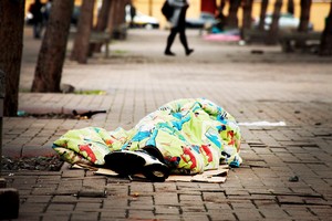 Photo of a homeless man sleeping