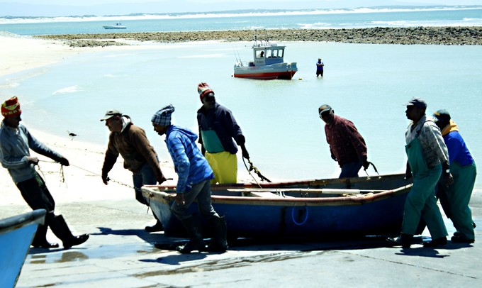 Photo of fishermen in the sea 