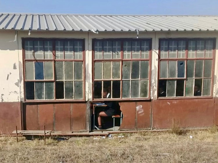 Photo of a broken school building