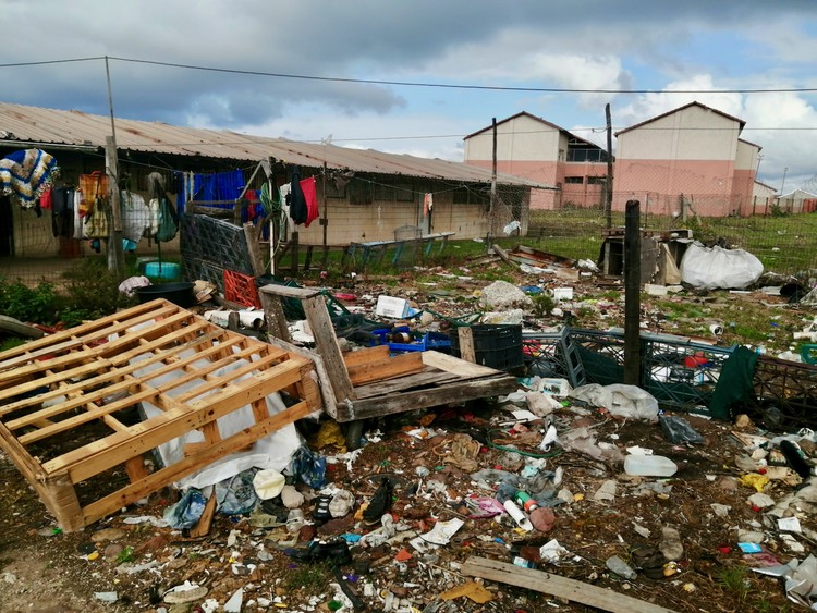 Photo of school grounds strewn with rubbish