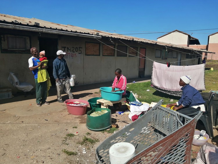 Photo of residents doing the washing