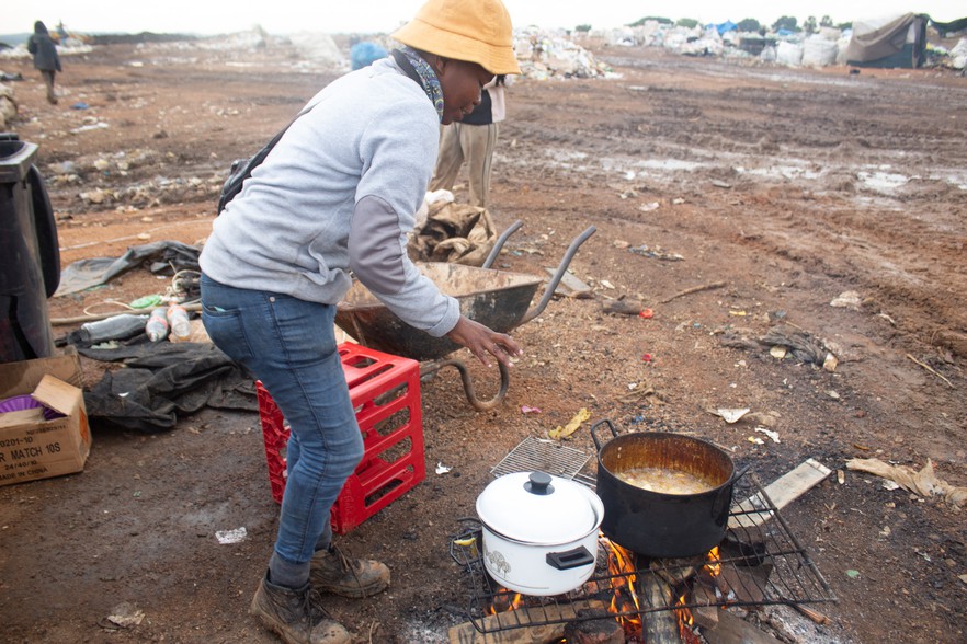 Lerato Moema sells food and cold drinks at the dump site. Photo: Mosima Rafapa