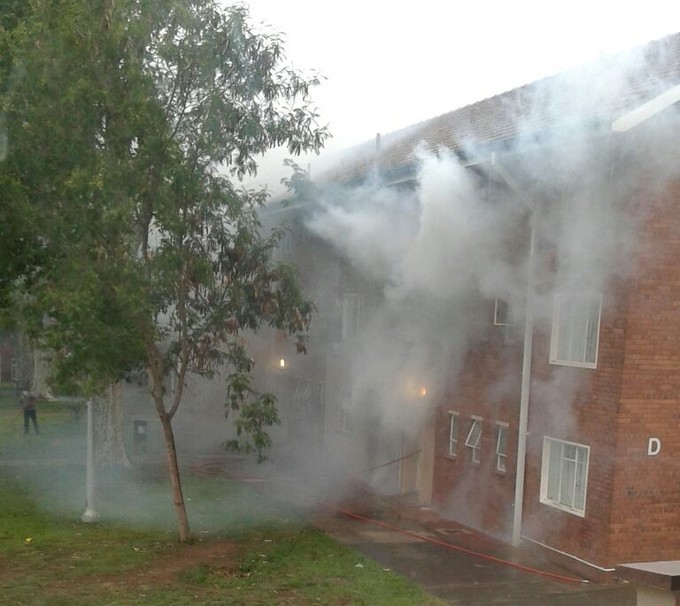 Photo of teargas smothering building
