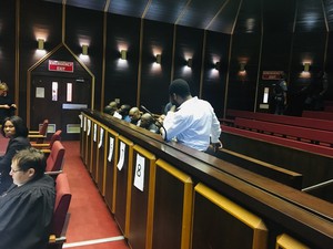Photo of men in dock in court