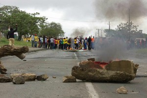 Photo of burning barricade on road