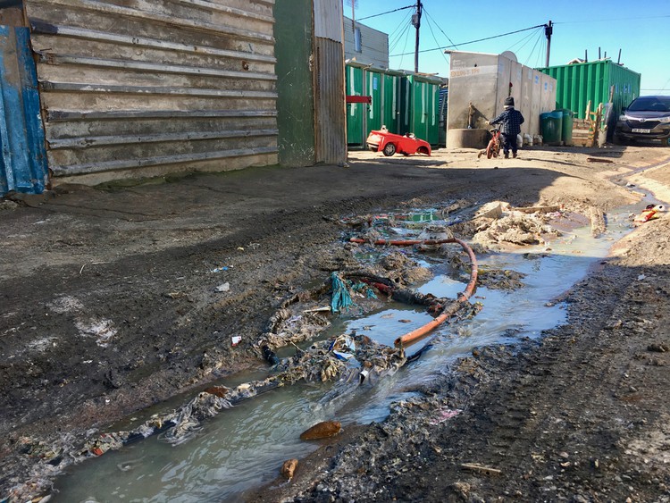 Photo of a street with sewage
