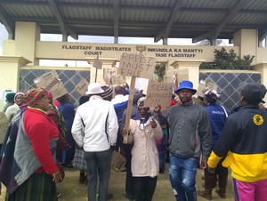 Photo of marchers at magistrates court