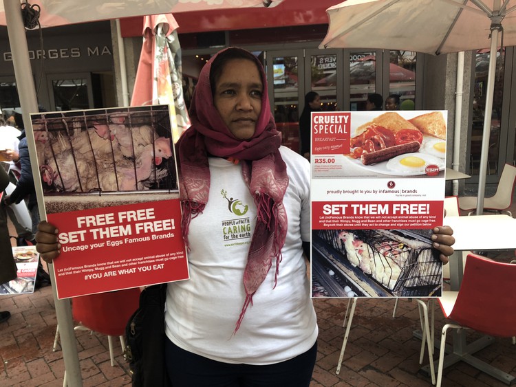 Photo of woman with placards